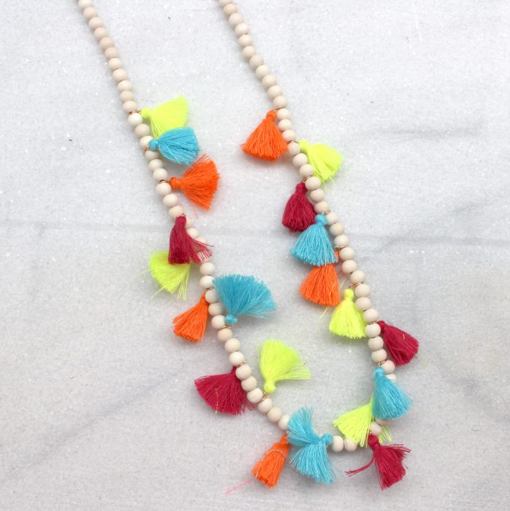 A photo of the Neon Tassel Necklace product