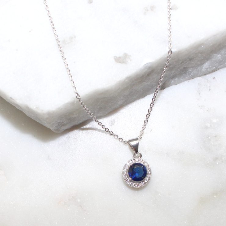 A photo of the Round Pendant Necklace product