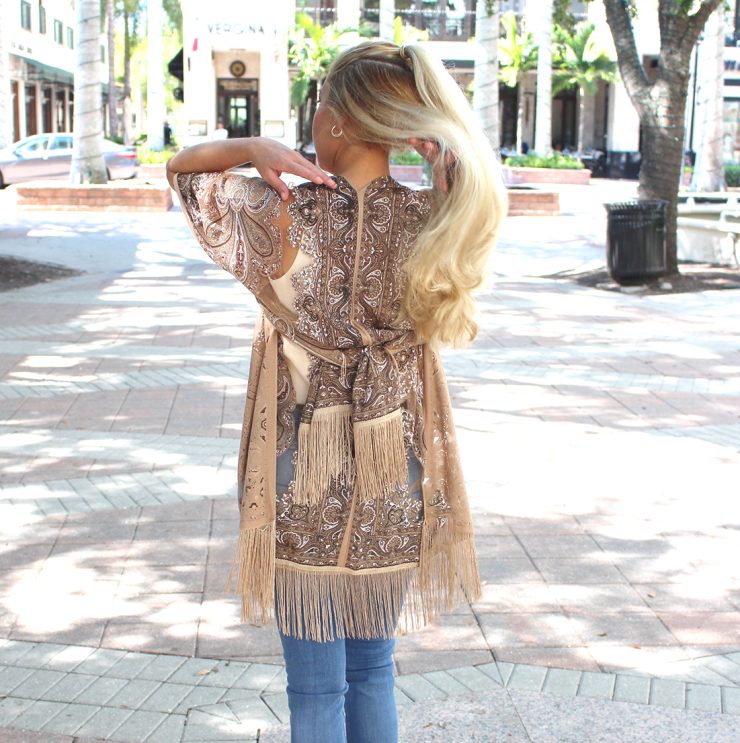 A photo of the Paisley Fringe Kimono product