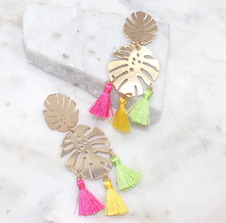 A photo of the Tropical Leaf Tassel Earrings product