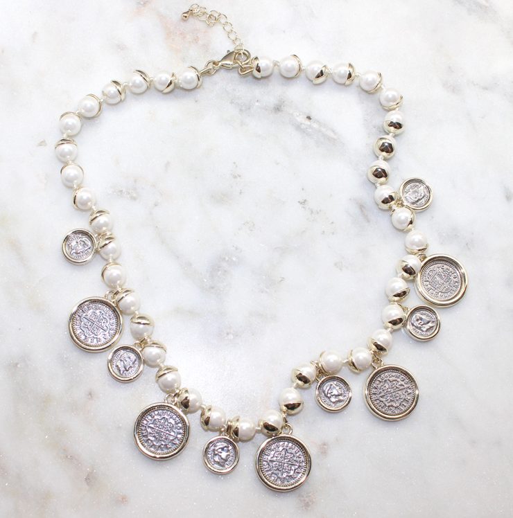 A photo of the Pearl Coin Necklace product