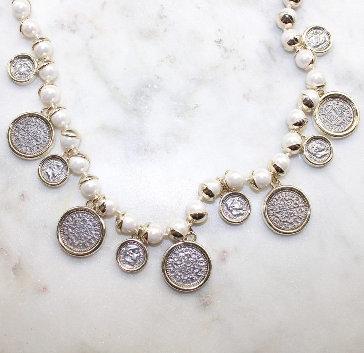 A photo of the Pearl Coin Necklace product