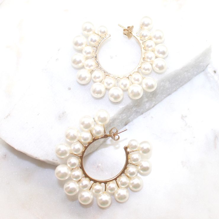 A photo of the Sheen Earrings product
