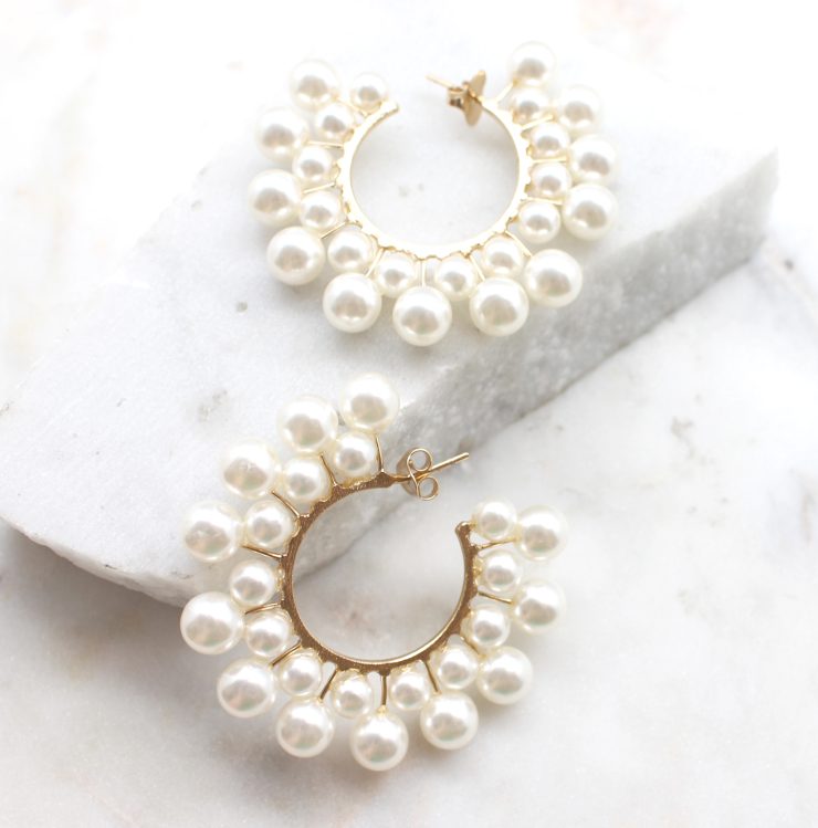 A photo of the Sheen Earrings product