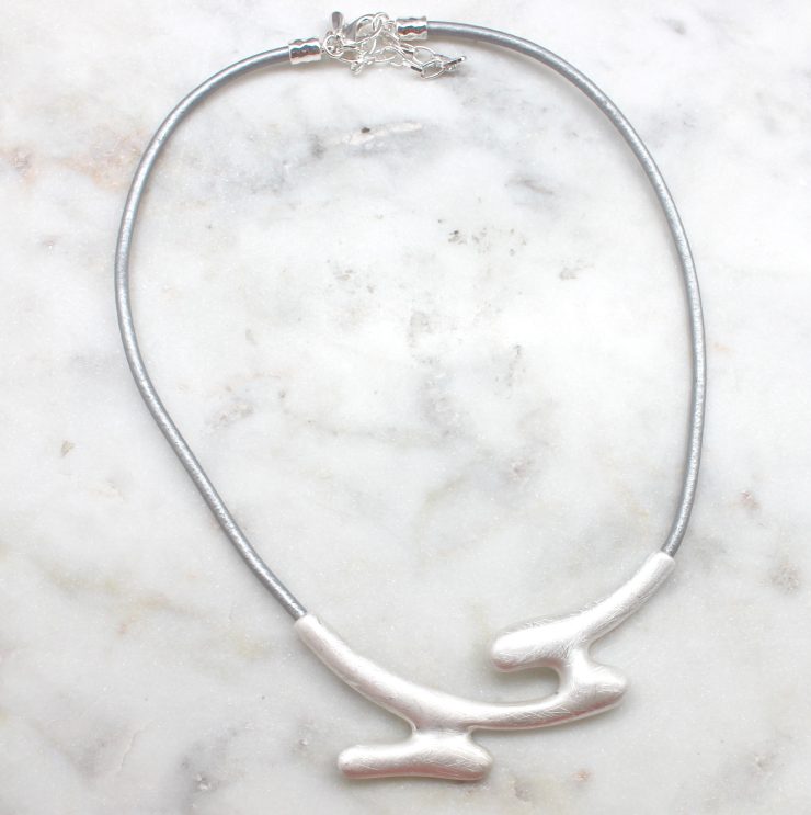 A photo of the Jigsaw Necklace product