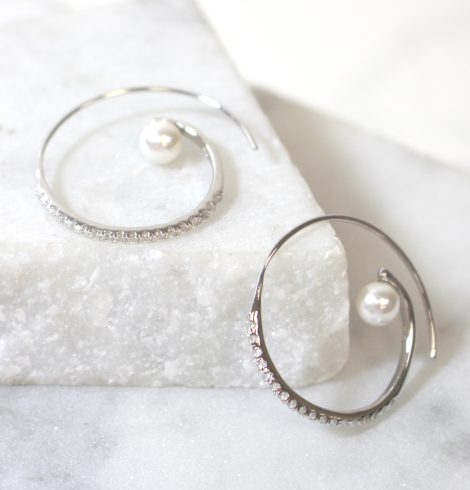 A photo of the Swirl Pearl Hoops product