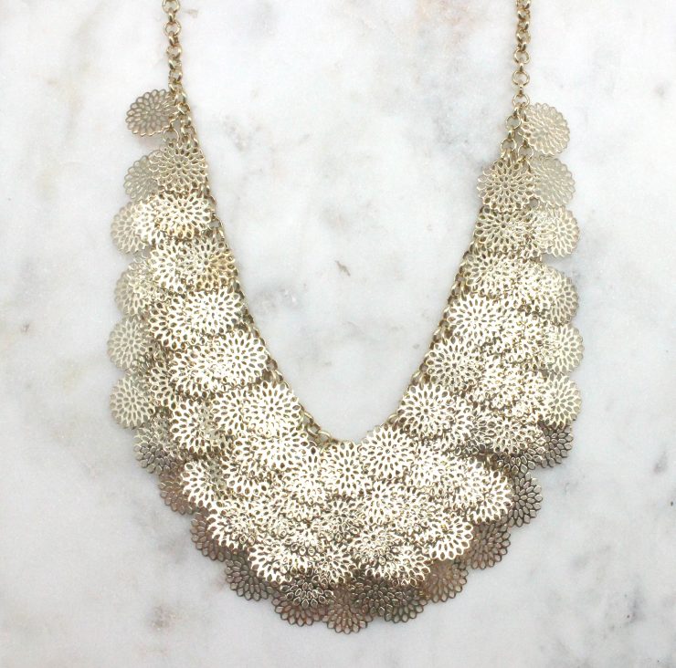 A photo of the Cutout Coins Necklace product