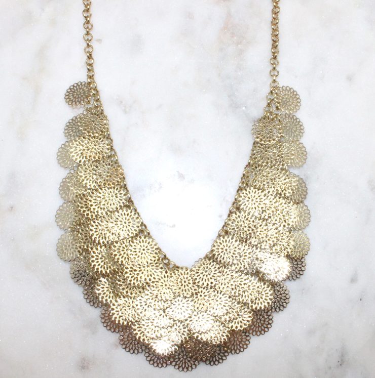 A photo of the Cutout Coins Necklace product