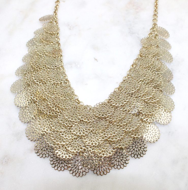 A photo of the Cutout Coins Necklace product