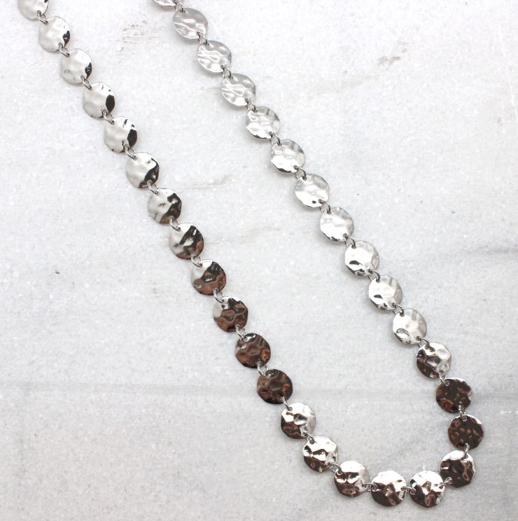 A photo of the Hammered Disc Necklace product