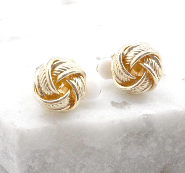 A photo of the Knot Clip On Earrings product