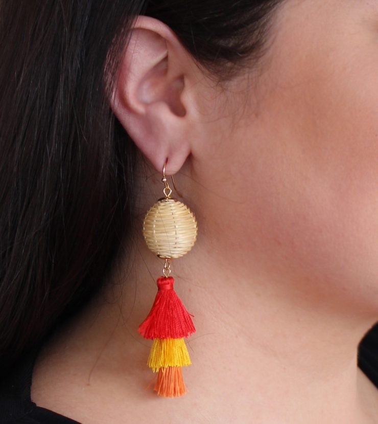 A photo of the Neva Tiered Tassel Earrings product