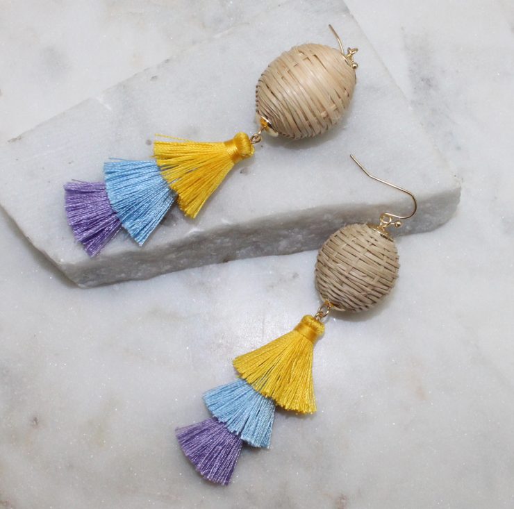 A photo of the Neva Tiered Tassel Earrings product
