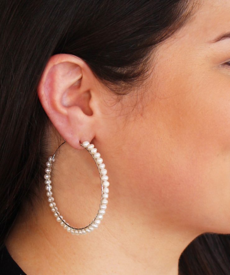 A photo of the Wrapped Pearl Hoops product