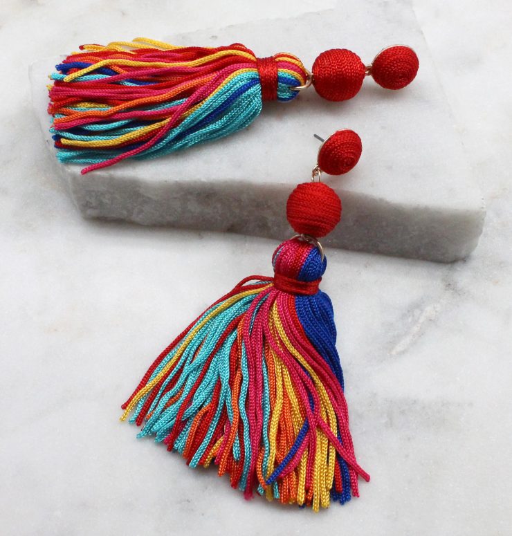 A photo of the Olé Tassel Earrings In Multi Color product