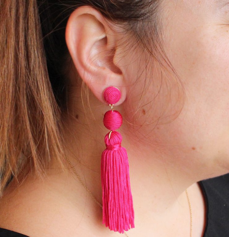 A photo of the Olé Tassel Earrings In Multi Color product