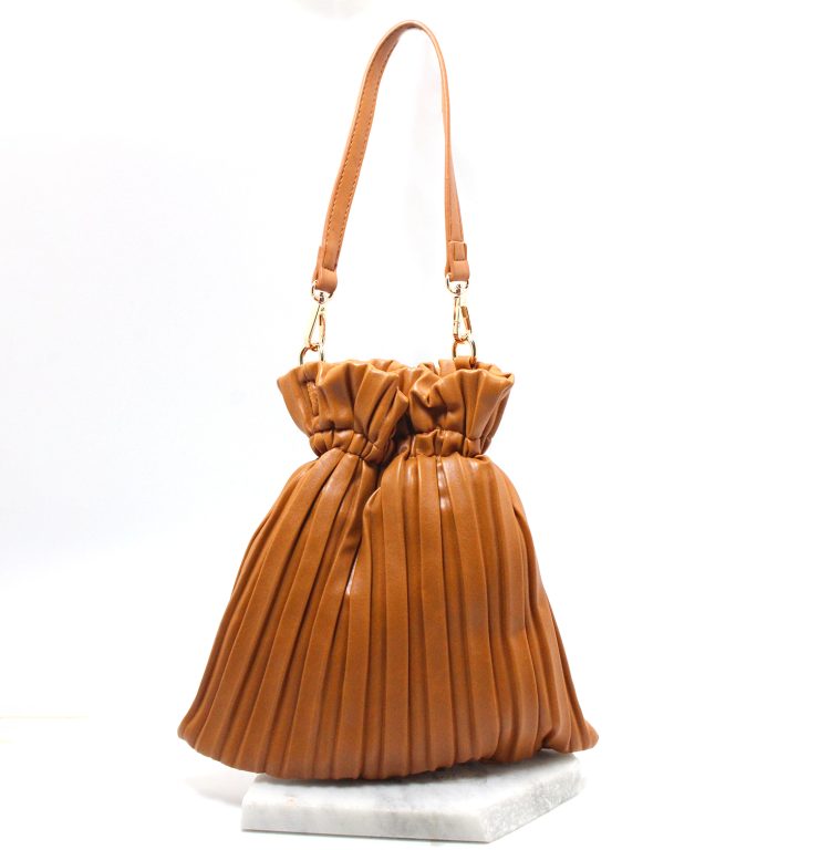 A photo of the Amaya Purse in Tan product