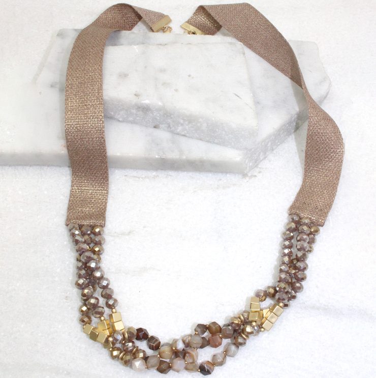 A photo of the Beaded Ribbon Necklace in Grey product