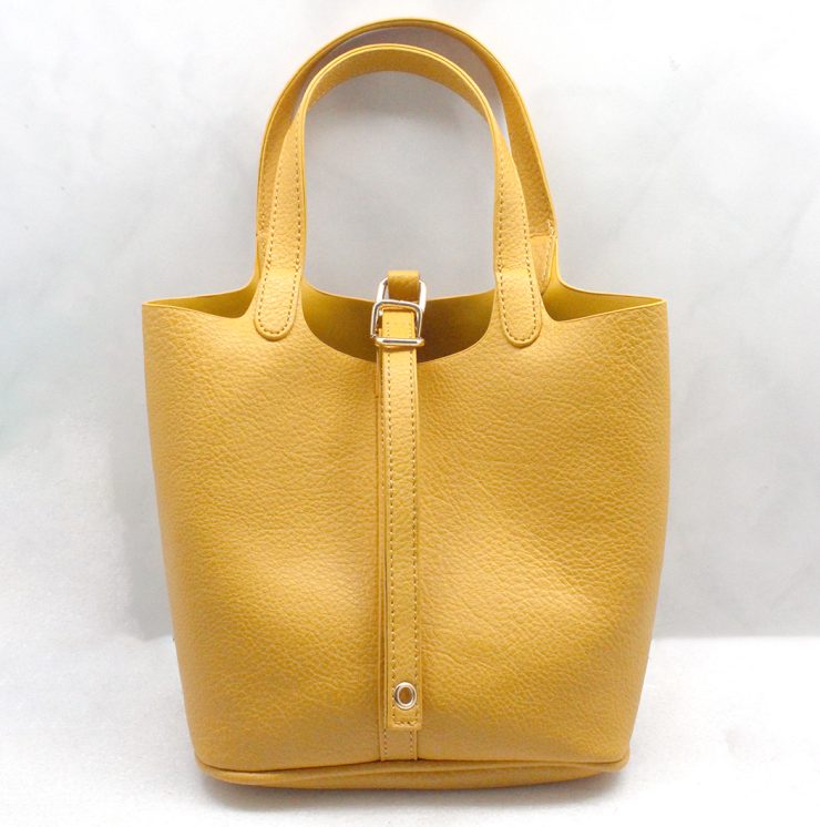 A photo of the Beth Hand Bag in Mustard product