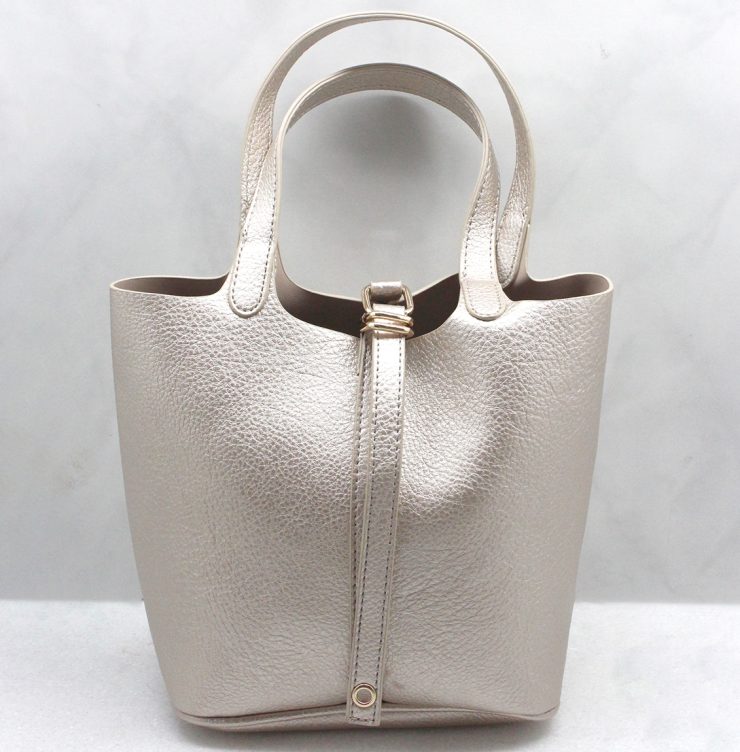 A photo of the Beth Hand Bag in Gold product