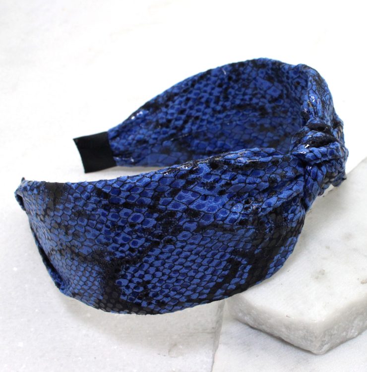 A photo of the Bitten Headband in Blue product