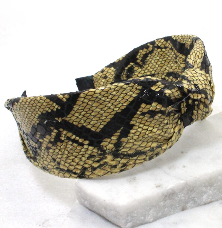 A photo of the Bitten Headband in Yellow product