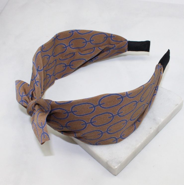 A photo of the Brown & Blue Link Headband product