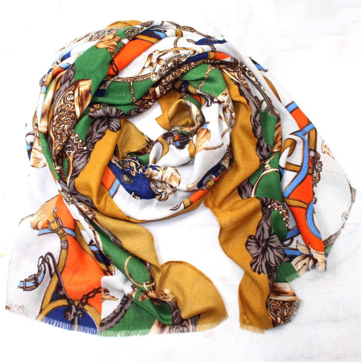 A photo of the Changing Leaves Orange Scarf product