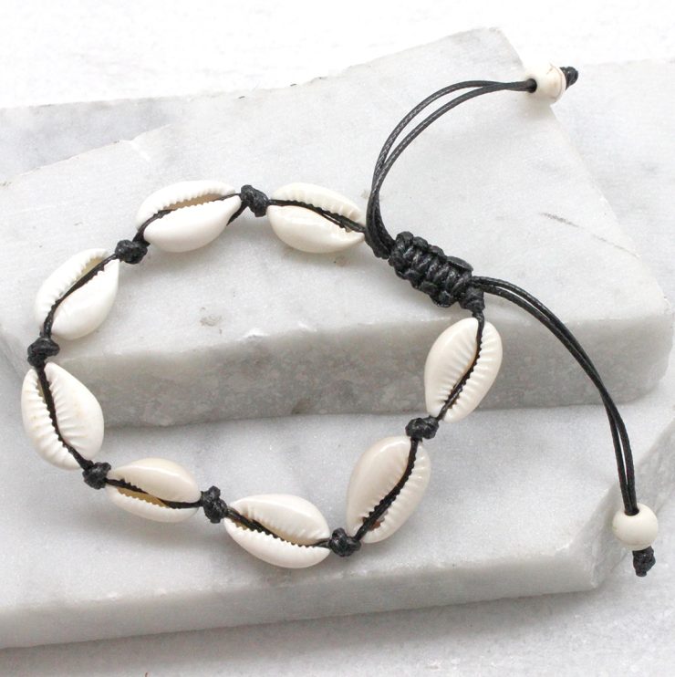 A photo of the Cowrie Bracelet in Black product