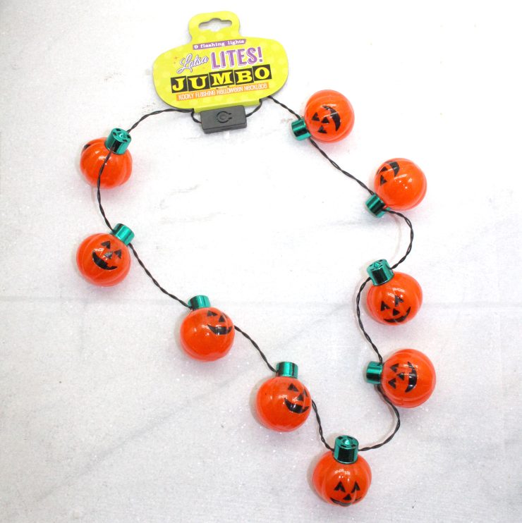 A photo of the Light Up Jack-O-Lantern Necklace product