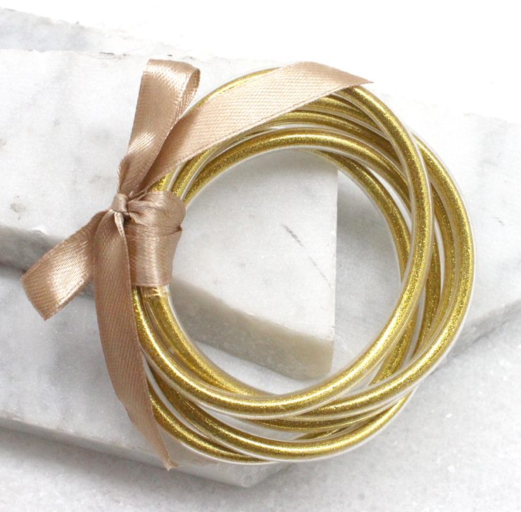 A photo of the Zen Bracelets in Gold product