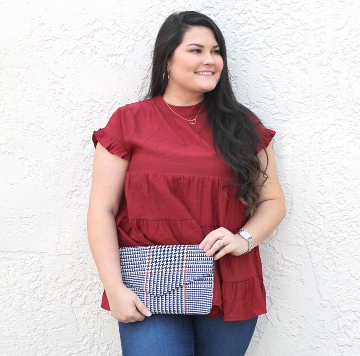 A photo of the Houndstooth Clutch in Brown product