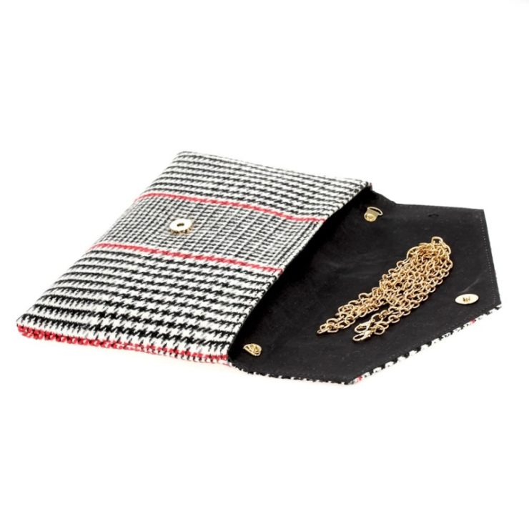 A photo of the Houndstooth Clutch in Red product