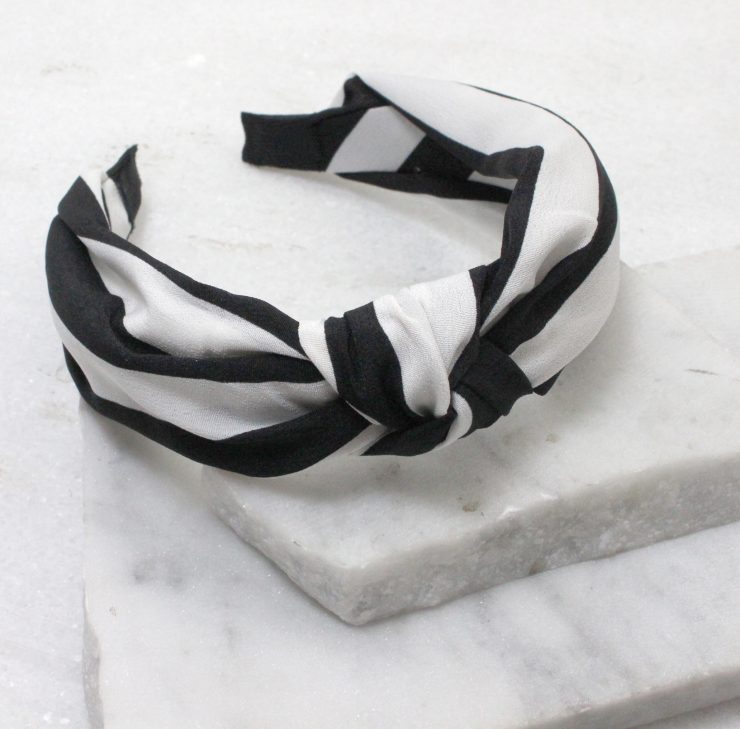 A photo of the I Kid You Knot Headband in Navy product