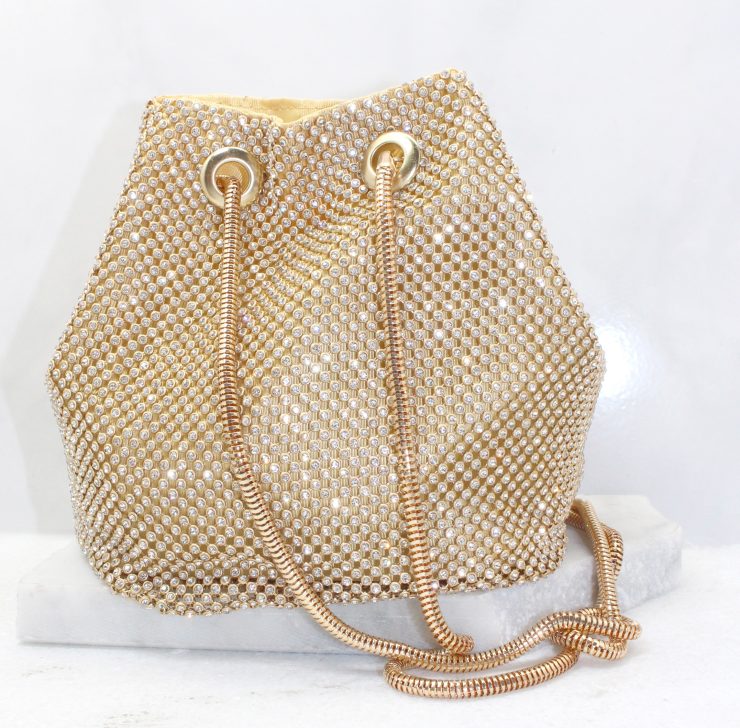 A photo of the Kiki Evening Bag In Gold product