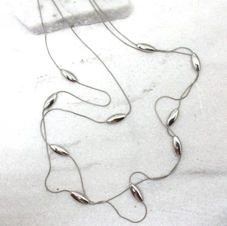 A photo of the Lorna Necklace in Silver product
