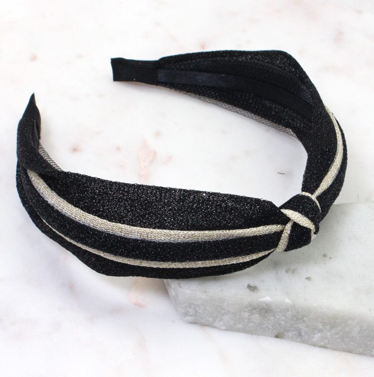 A photo of the Metallic Knot Headband in Black product