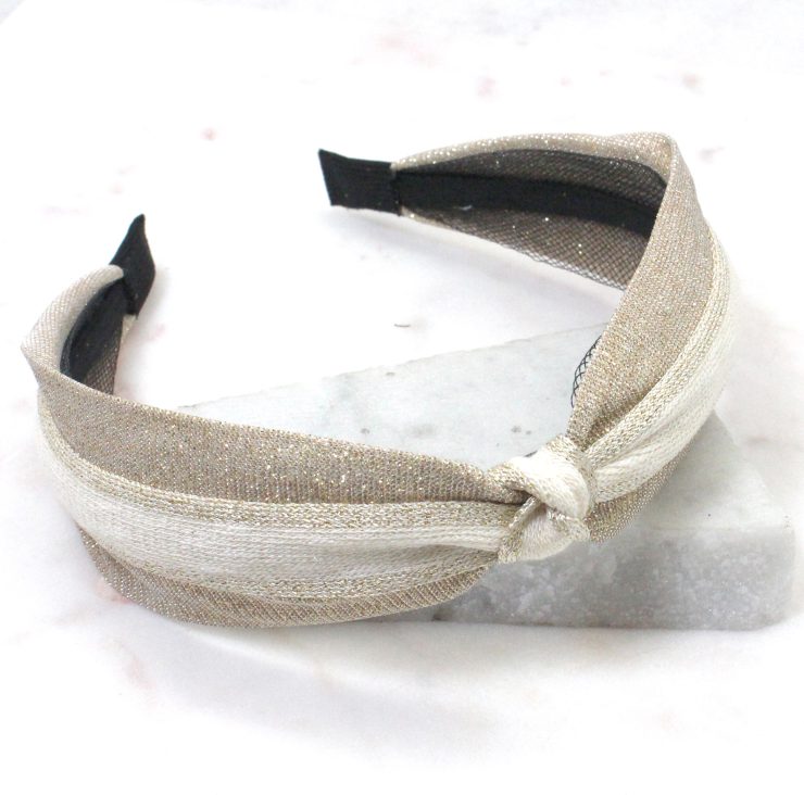 A photo of the Metallic Knot Headband in Black product