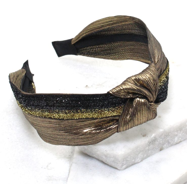 A photo of the Metallic Made Headband in Silver product