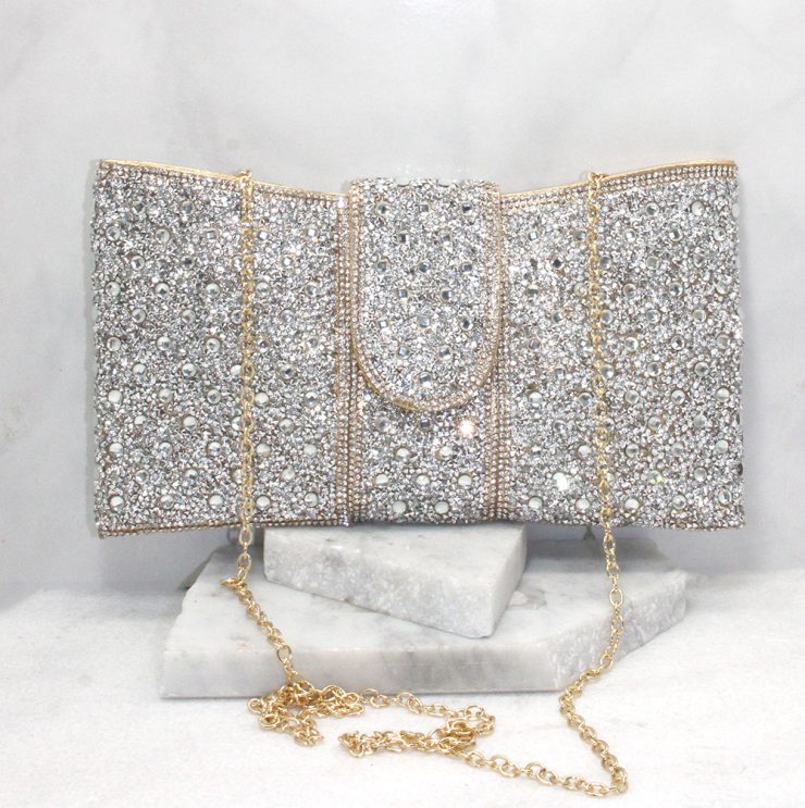 A photo of the Portia Clutch in Gold product