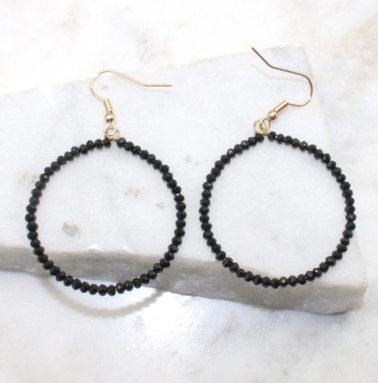 A photo of the Large and Small Round The Way Earrings product