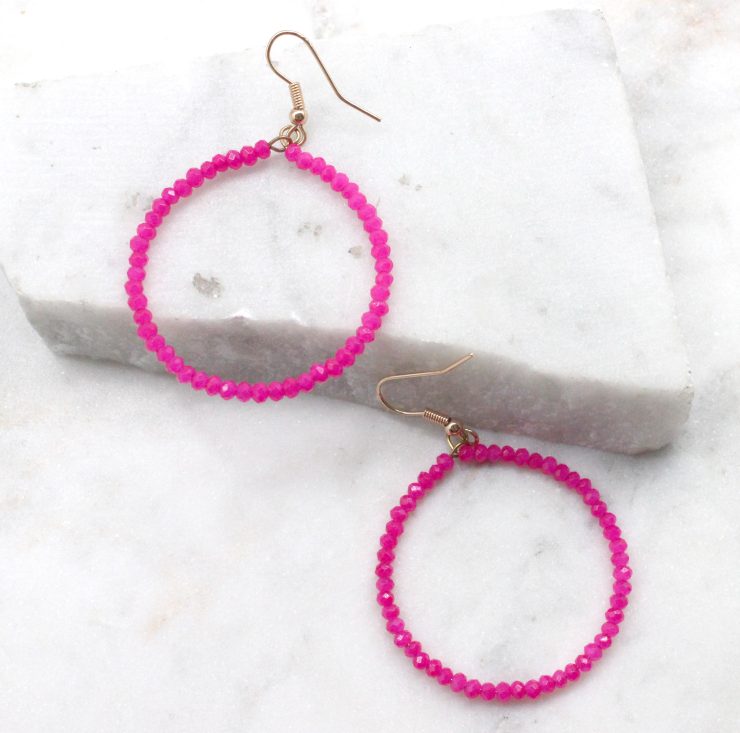 A photo of the Large and Small Round The Way Earrings product