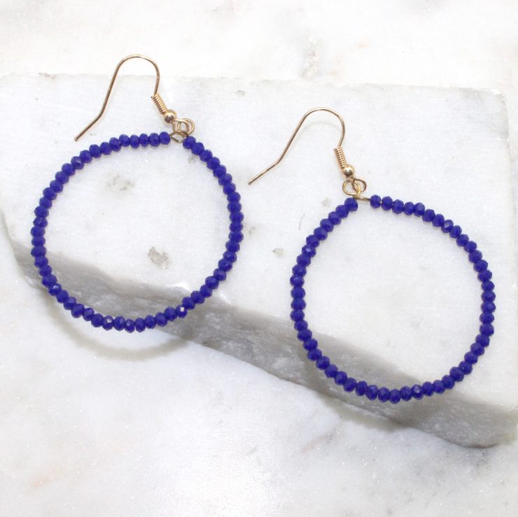 A photo of the Large and Small Round The Way Earrings product