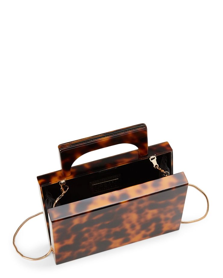 A photo of the Scarlett Tortoiseshell Clutch product