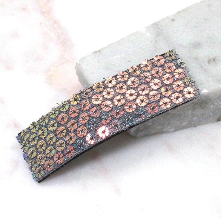 A photo of the Sequin Barrette in Silver and Pink product