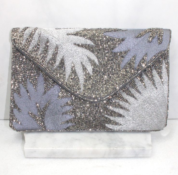A photo of the Silver Palm Clutch product