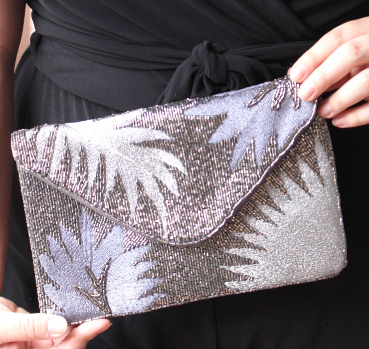 A photo of the Silver Palm Clutch product