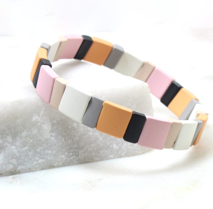 A photo of the The Dreamsicle Pieces Color Block Bracelet product