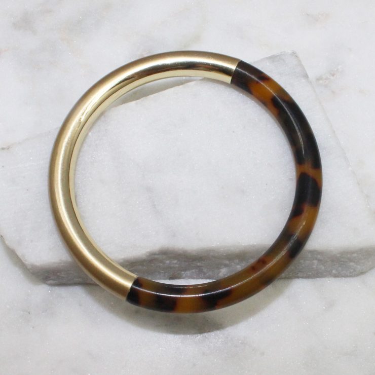 A photo of the Tortoise Shell Bangle product