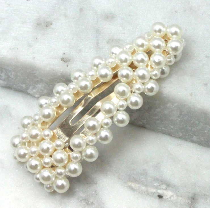 A photo of the Assorted Pearl Barrette product